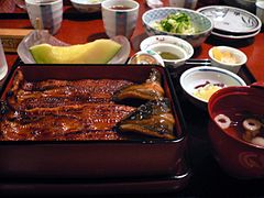 Unagi - broiled (kabayaki) eel on rice, served in a lacquered meal box