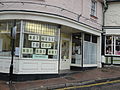 A laundrette in the High Street, Ventnor, Isle of Wight, seen with a sign outside asking people to sign a petition against Natwest in the town from closing its local branch.