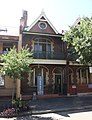Vermont Terrace, Millers Point (1891). An early, fairly groundbreaking terrace-pair, with polychrome brick and rounded windows. Possibly designed by Morell & Kemp.[176][177]
