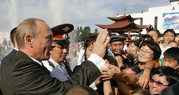 Vladimir Putin with local people in the Siberian republic of Tuva, 2007