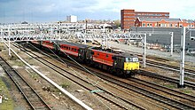 The railway at Rugby in 2004 WCML at Rugby.jpg