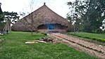 Grass thatched round hut very similar to Kasubi tombs, containing the tombs of Sunna II of the Buganda kingdom 1856