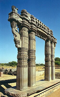 Kakatiya Kala Thoranam (Warangal Gate) built by the Kakatiya dynasty in ruins; one of the many temple complexes destroyed by the Delhi Sultanate.[30]