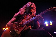 Doug Aldrich served as Coverdale's writing and producing partner on the albums Good to be Bad (2008) and Forevermore (2011) Whitesnake (2889475162).jpg