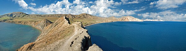 The Black Sea coast of Crimea. Vicinity of Koktebel. View from the Cape Chameleon. On the right - Tikhaya (Quiet) bay, on the left - Myortvaya (Dead) bay.