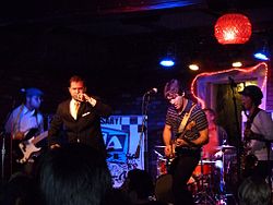 Sharing "the same DNA, songs, band members and resources", GOGO13 are credited for influencing the formation of The Aquabats, particularly in their use of humor and stage theatrics. 2011-02-18b 14 GoGo13 at Bottom of the Hill.jpg