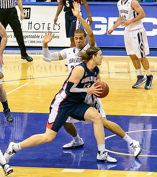 Gonzaga center Kelly Olynyk drives against Jito Kok in a conference game against San Diego on February 2, 2013