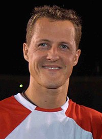 Defending world champion Michael Schumacher (pictured in 2005) won a second consecutive title with Benetton in his last year with the team. Aecio Neves, Michael Schumacher e Didi (Cropped).jpg