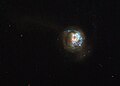 Фото Габбла галактики J125013.50+073441.5, зроблене як частина дослідження LARS (Lyman Alpha Reference Sample)