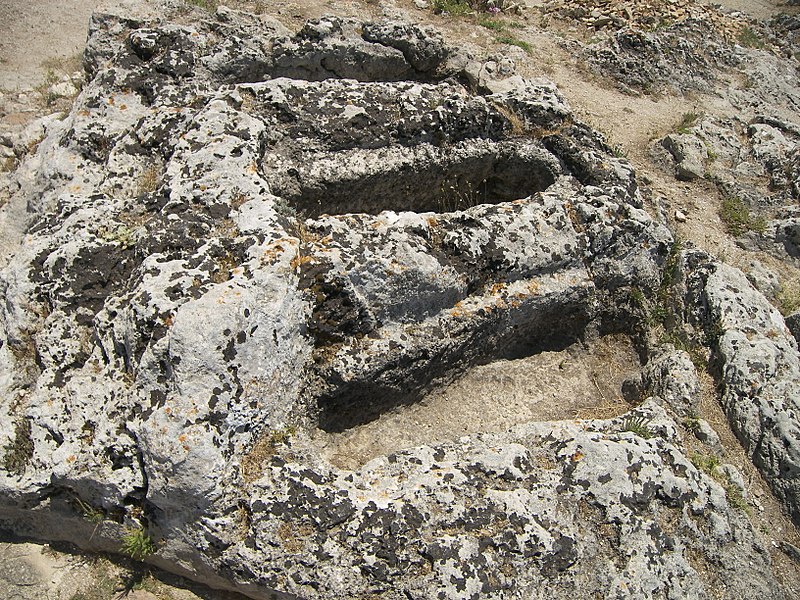 File:Anthropomorphic graves at Angelokastro in Corfu.jpg