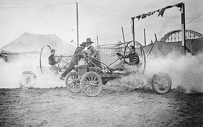 An auto polo match at Coney Island photographed by the Bain News Service. Cars had primitive metal hoops around the driver's seat and radiator to protect the occupants in the event of a rollover.