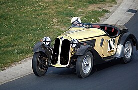 BMW 319/1 Sport at Nürburgring Südkehre in motion, front and left side