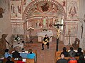 Johanna Beisteiner during a solo concert on 17 May 2012 at St. Helena's Church in Dellach (Hermagor, Carinthia, Austria). The foto also shows the frescos of the church.