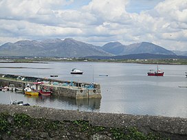 Boats and mountains, Roundstone (6047965086).jpg
