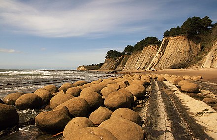Concretions on Bowling Ball Beach (Mendocino County, California) weathered out of steeply tilted Cenozoic mudstone.