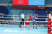 Deutsch: Boxen bei den Olympischen Jugendspielen 2018 Tag 12, 18. Oktober 2018 - Kampf um die Bronzemedaille im Fliegengewicht Mädchen – Heaven Destiny Garcia (USA, blau) schlägt Goryanana Stoeva (Bulgarien, rot) 5-0; Ringrichter ist Ishanguly Meretnyyazov (Turkmenistan). English: Boxing at the 2018 Summer Youth Olympics on 18 October 2018 – Girl's flyweight Bronze Medal Bout - Heaven Destiny Garcia (USA, blue) beats Goryanana Stoeva (Bulgaria, red) 5-0; Referee is Ishanguly Meretnyyazov (Turkmenistan). Español: Boxeo en los Juegos Olímpicos Juveniles de Verano de 2018 en 18 de octubre de 2018 - Combate a medalla de bronce de peso mosca para mujeres: Heaven Destiny Garcia (Estados Unidos, azul) le gana a Goryanana Stoeva (Bulgaria, roja) 5-0; El árbitro es Ishanguly Meretnyyazov (Turkmenistán).