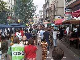 A street scene in Matonge, one of Belgium's most diverse neighborhoods with a high African population (2009) Bruxelles Matonge en Couleurs 2009 002.jpg