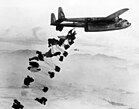 C-119B Flying Boxcar drops supplies near Chungju 1951.JPEG