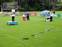 A competitor, Jana Maisel, casts her fly into one of the goal pools at the 2005 World Games in Duisburg. Casting Fly (Sports).jpg