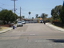 PSA 182 crash site as it appeared in 2010: Looking west down Dwight St., Nile Street intersection is in foreground; Boundary St. intersection in background. The initial impact was about 30 ft (9.1 m) to the right of the photographer, on Nile St. DwightandNile2010.JPG