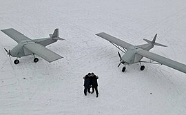 Совладелец компании AeroDrone Дмитрий Шимкин с двумя E-300 Enterprise