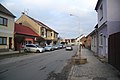 Čeština: Východní pohled do ulice Nádražní v Okříškách, okr. Třebíč. English: East view of Nádražní street in Okříšky, Třebíč District.