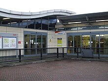 Entrance on the London-bound side Feltham station entrance.JPG