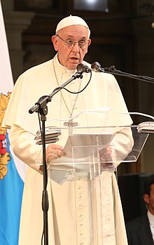 Pope Francis making a speech in the Pontifical Catholic University of Chile (2018). The Catholic Church in Chile in 2018 suffered one of the worst of the worldwide Catholic sexual abuse cases, including the Fernando Karadima case, resulting in several convictions and resignations. Francisco en la PUC (25879476708) - cropped.jpg