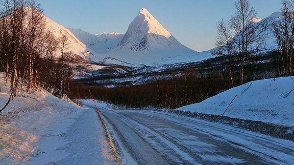 The 1505 m / 5000 ft Piggtind in the Lyngen Alps, at the intersection of Tromsø, Balsfjord and Storfjord municipalities. February 2009.