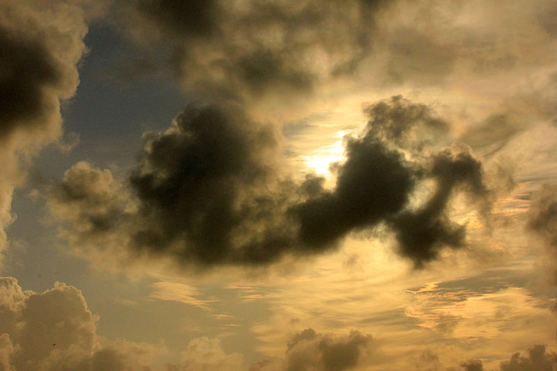 File:Gfp-sun-wrapped-in-clouds.jpg