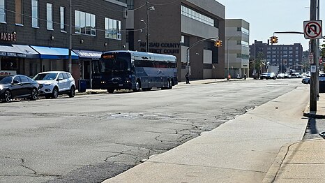 Greyhound Bus stopping outside the terminal