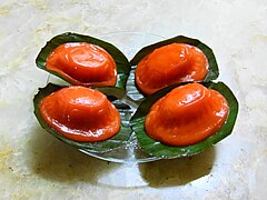 Kue ku, derived from Chinese Ang Ku Kueh