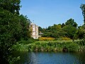 The lake at Lamorbey Park, with part of Lamorbey House visible, in Lamorbey.