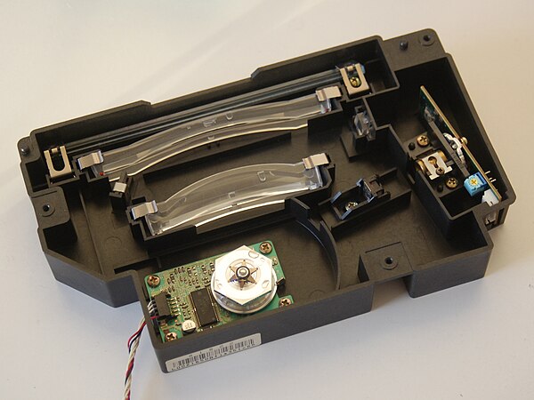 Laser unit from a Dell P1500. The white hexagon is the rotating scanner mirror.