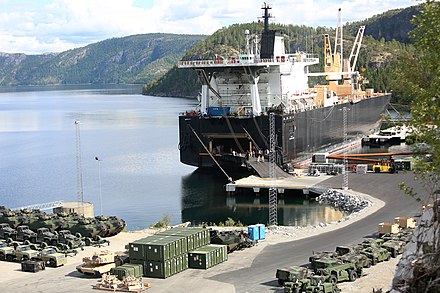Vehicles and equipment being offloaded in 2014 as part of the modernization of the US Marine Corps materiel stored in Norway