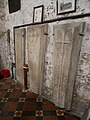 Medieval gravestones in the tower at the Church of John the Baptist in Erith. [183]