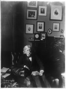 Photograph of Fuller, seated