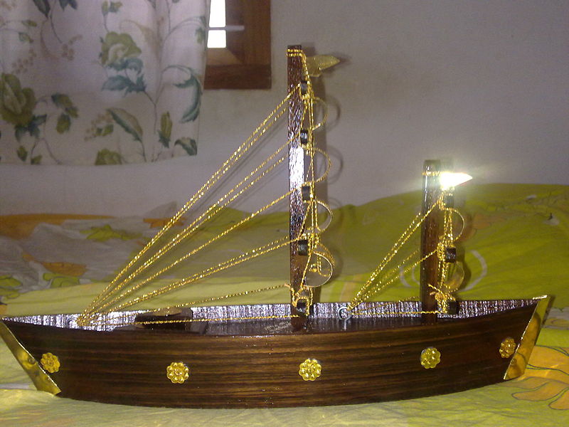 File:Memento showing boat with sail.jpg