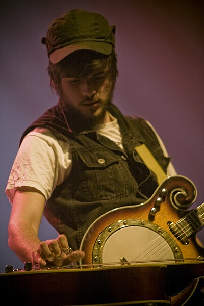Marshall performing with Mumford & Sons in 2010