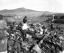 The Nagasaki Prefecture Report on the bombing characterized Nagasaki as "like a graveyard with not a tombstone standing". Nagasaki temple destroyed.jpg
