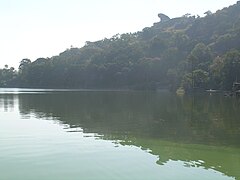 Toad rock and the Maharaja's palace can be seen in the background of the Nakki Lake.