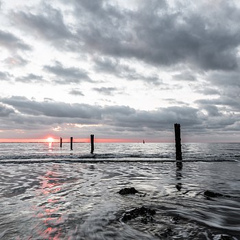 Sunset at beach “Weststrand” of Norderney, Lower Saxony, Germany