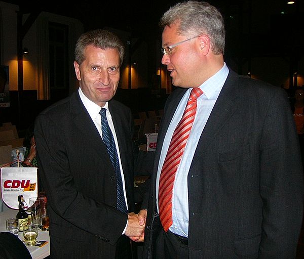 Oettinger with Cai-Ullrich Fark Warthausen's former Mayor at a CDU rally in Biberach-Riss, September 2009