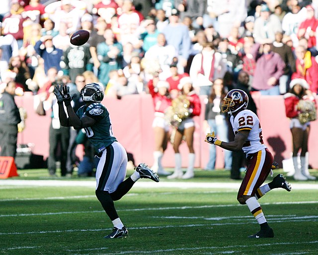 Vick Leads Eagles in Record-Setting NFL Rout of Redskins