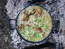 A kabsa dish made with kid meat, wild asparagus and bomba rice Rice dish made with kid and wild asparagus.jpg