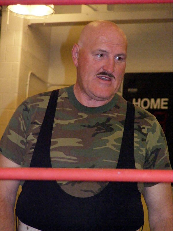 Slaughter in a 2009 match without his trademark hat and glasses