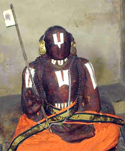 The figure of Ramanuja in Upadesa Mudra inside the Ranganathaswamy Temple, Srirangam. It is believed to be his preserved mortal remains.
