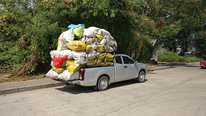 Pickup truck with waste outside Sisaket recycling centre