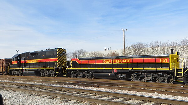 This locomotive and slug of the Iowa Interstate Railroad resemble a cow-calf set, but the slug has no engines of its own; this allows it to be cut dow