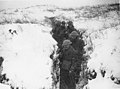 Soldiers in a trench on the Western Front in World War I in winter.